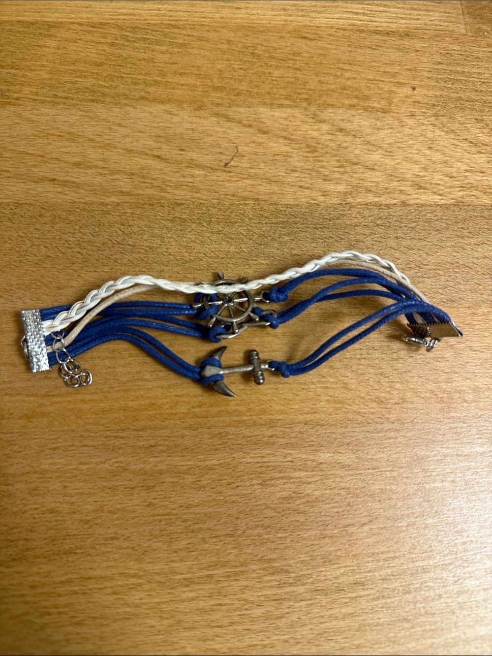 Blue and white rope multistrand bracelet with nautical silver tone metallic